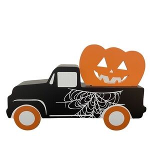 Halloween Black Spider Web Truck Hauling a Pumpkin